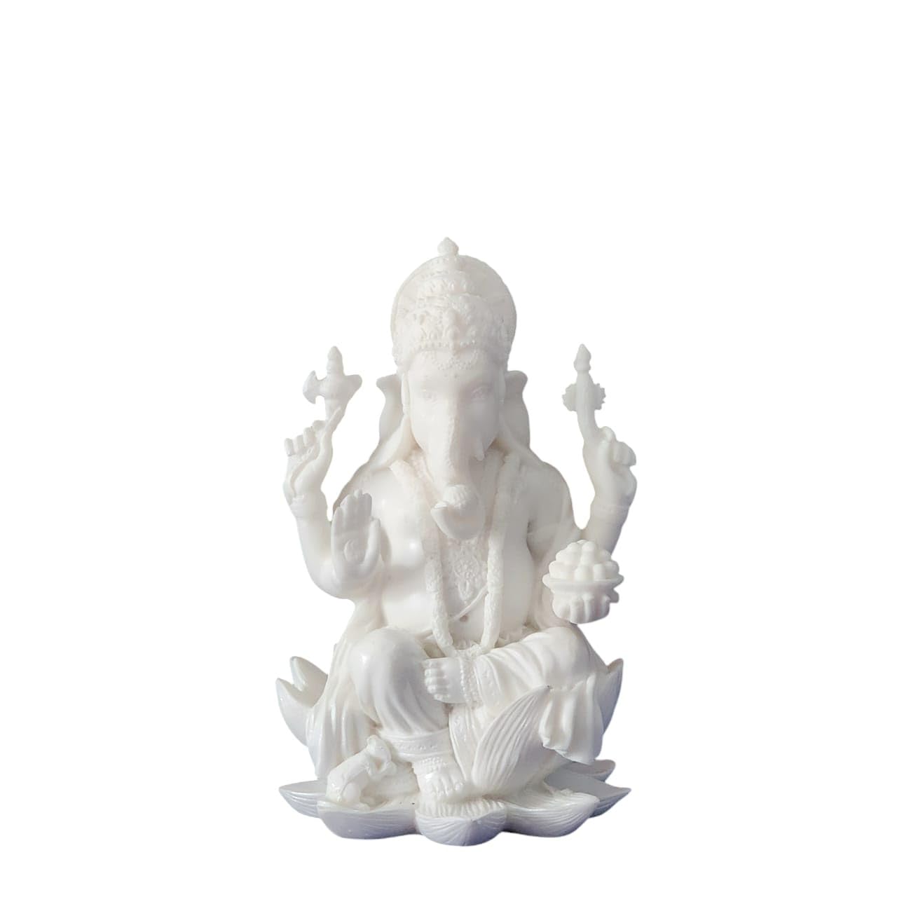 White statue of a seated figure with a lotus flower on a white background