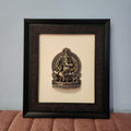 Framed decorative wall art with a religious icon on a beige background