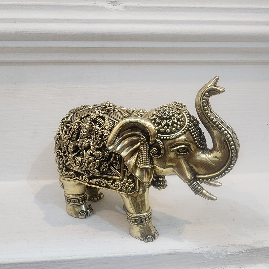 Elephant statue with trunk up laxmi ganesh