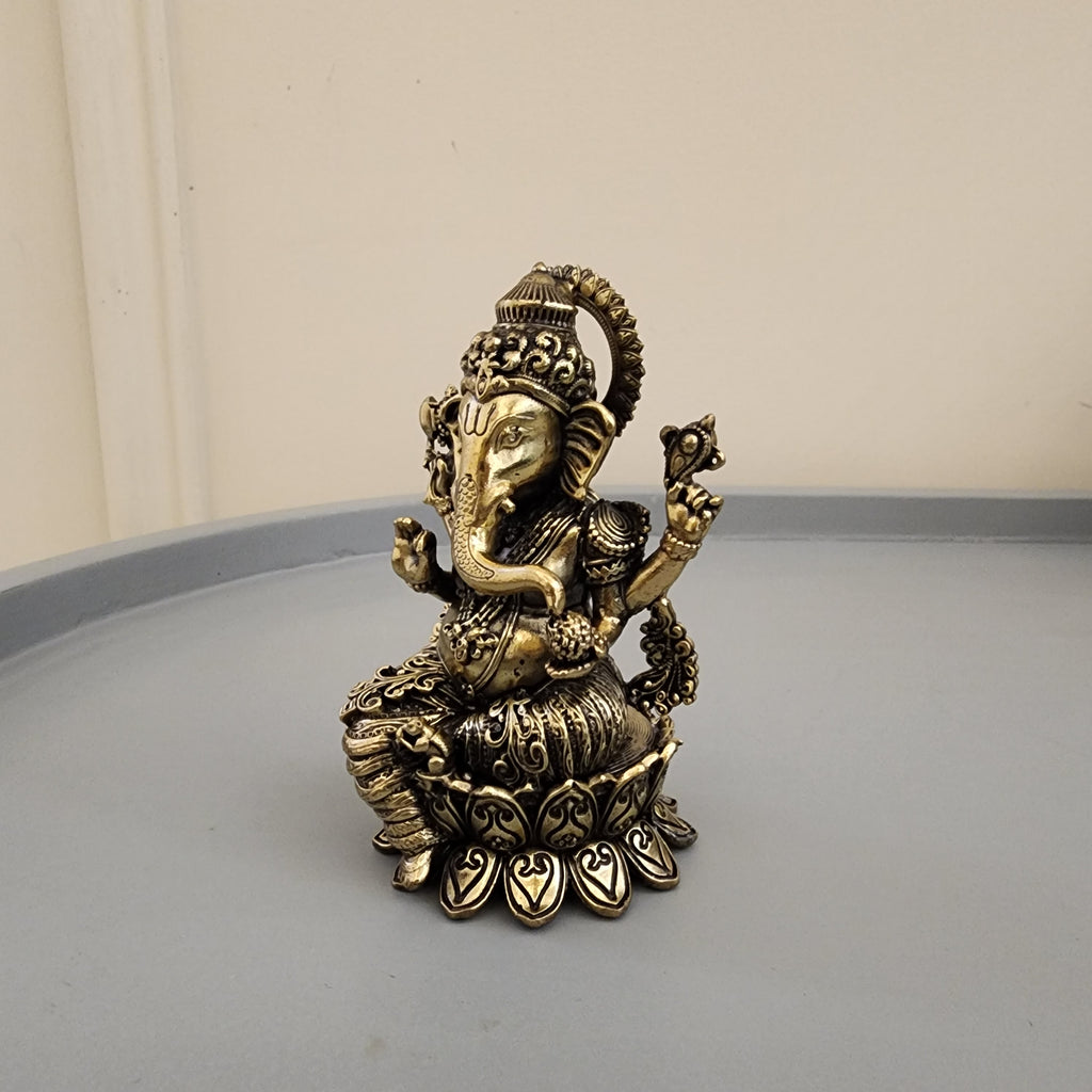 Brass Ganesh Statue sitting on lotus 4 inch [200gram]