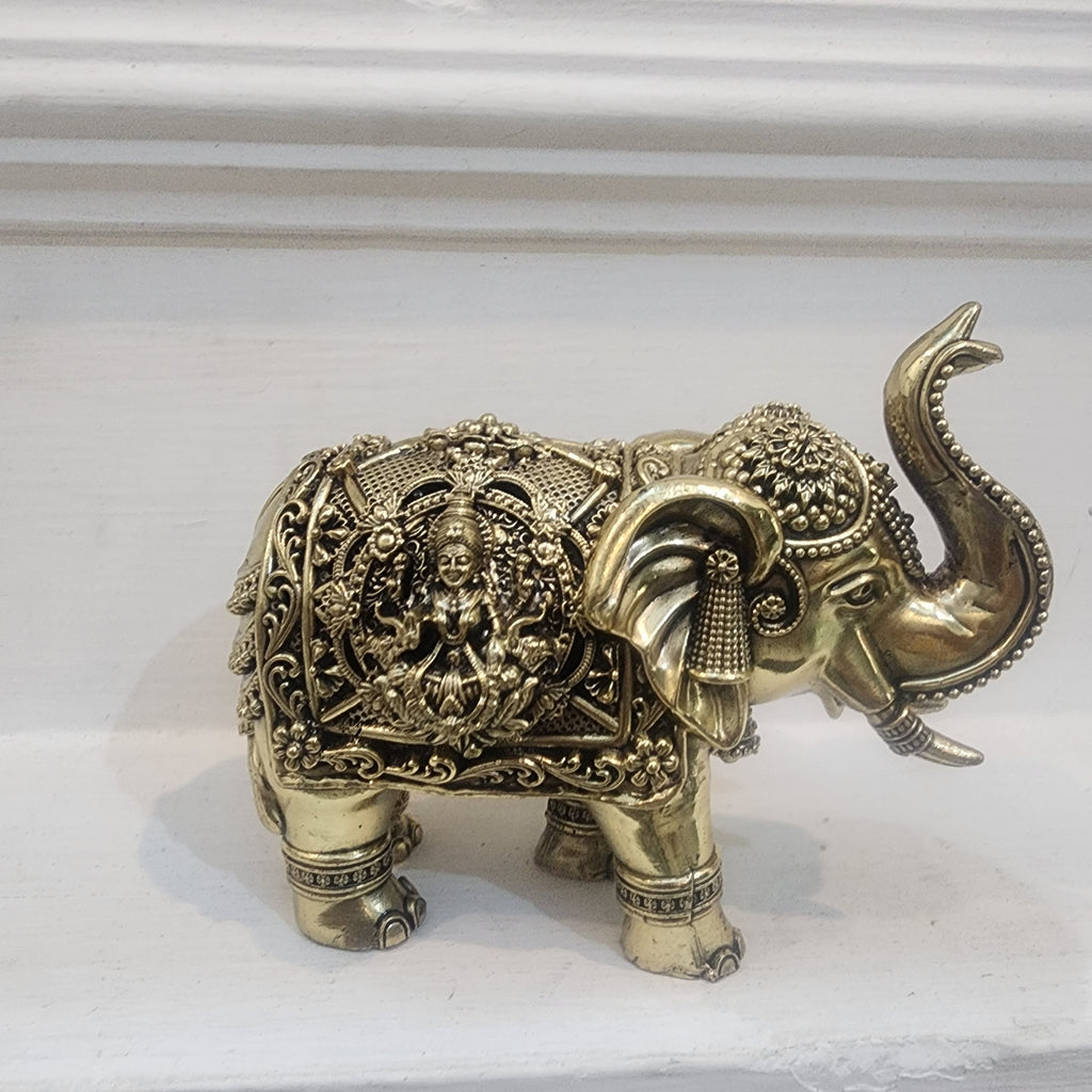 Elephant statue with trunk up laxmi ganesh